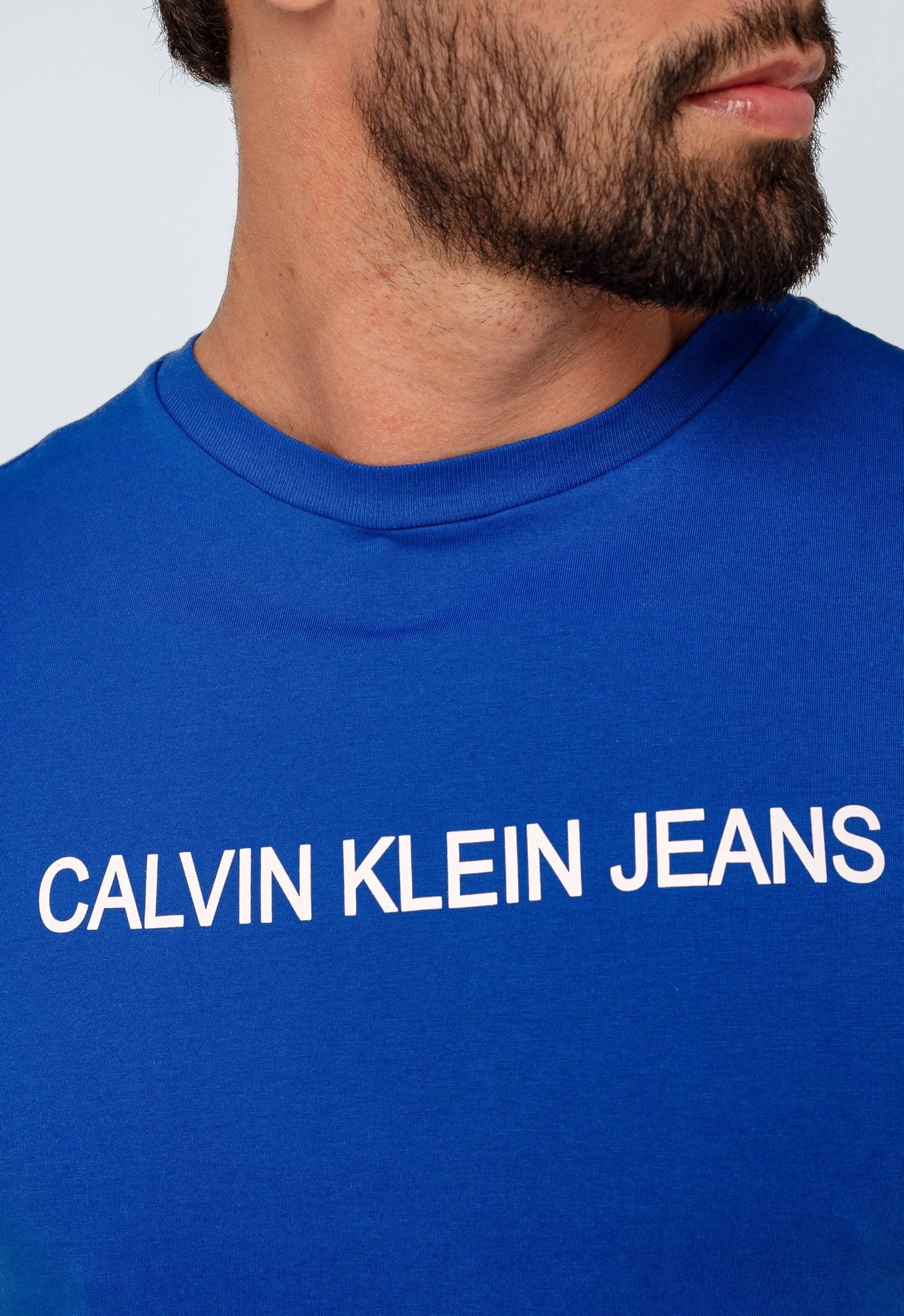 Camiseta Calvin Klein Jeans Logo Central CK - Henri Store