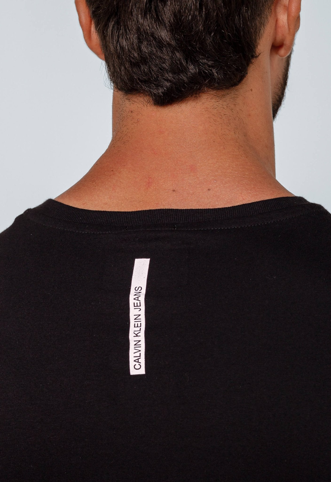 Camiseta Calvin Klein Jeans Logo Central CK - Henri Store