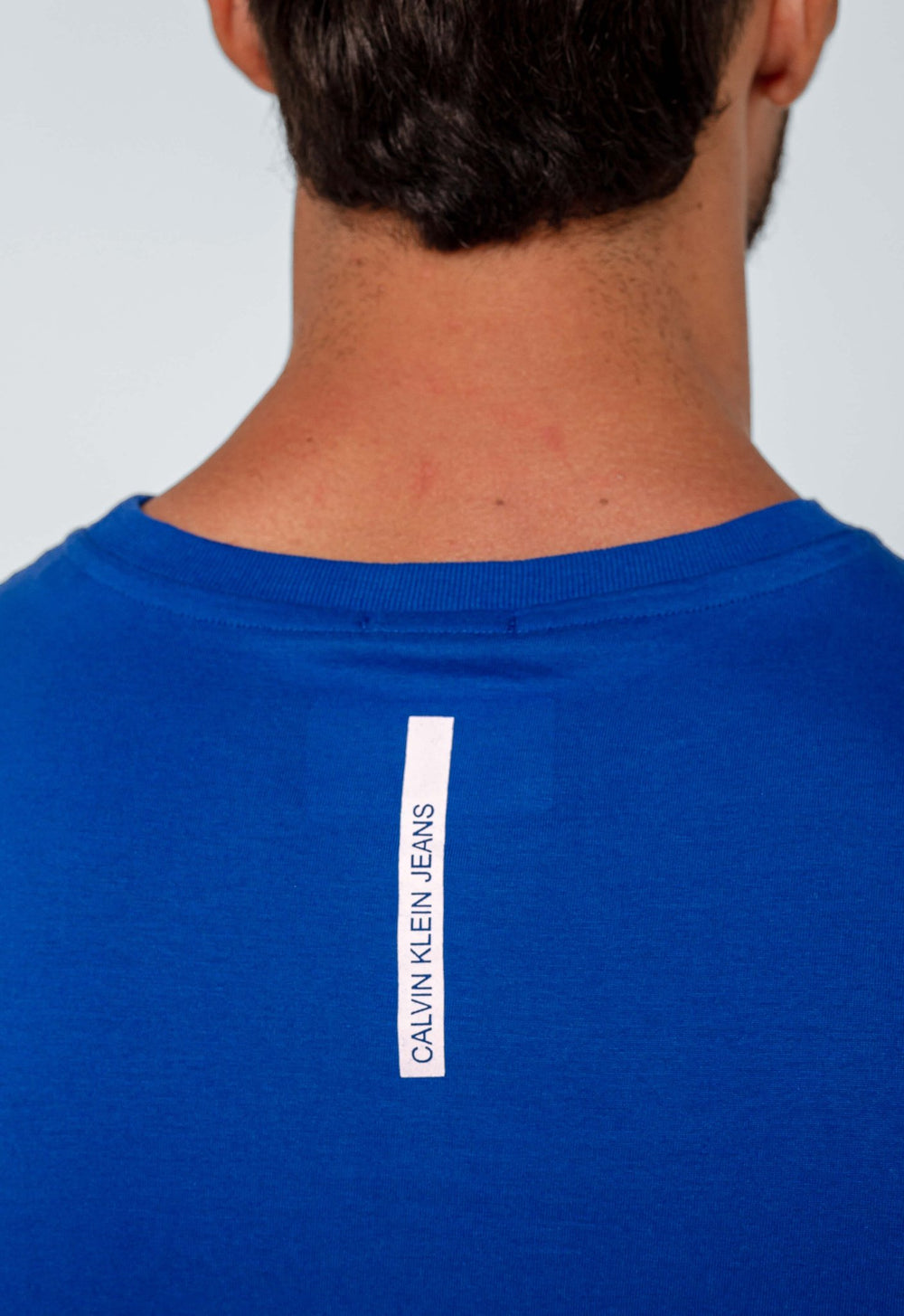 Camiseta Calvin Klein Jeans Logo Central CK - Henri Store