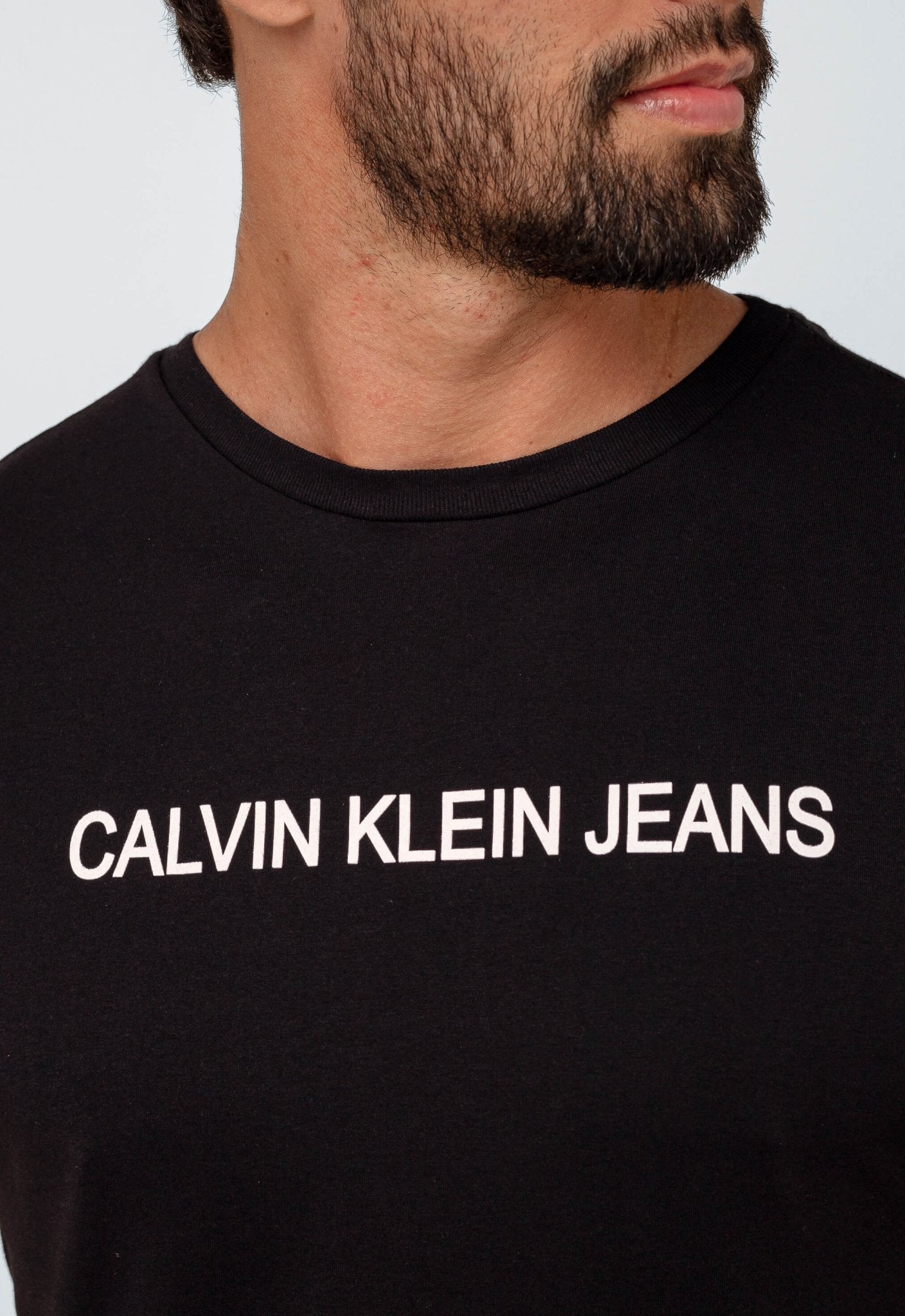 Camiseta Calvin Klein Jeans Logo Central CK - Henri Store