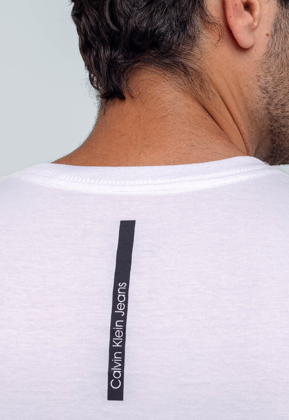Camiseta Calvin Klein Jeans Logo Central Embossed - Henri Store