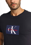Camiseta Calvin Klein Jeans Logo Central - Sale - Henri Store