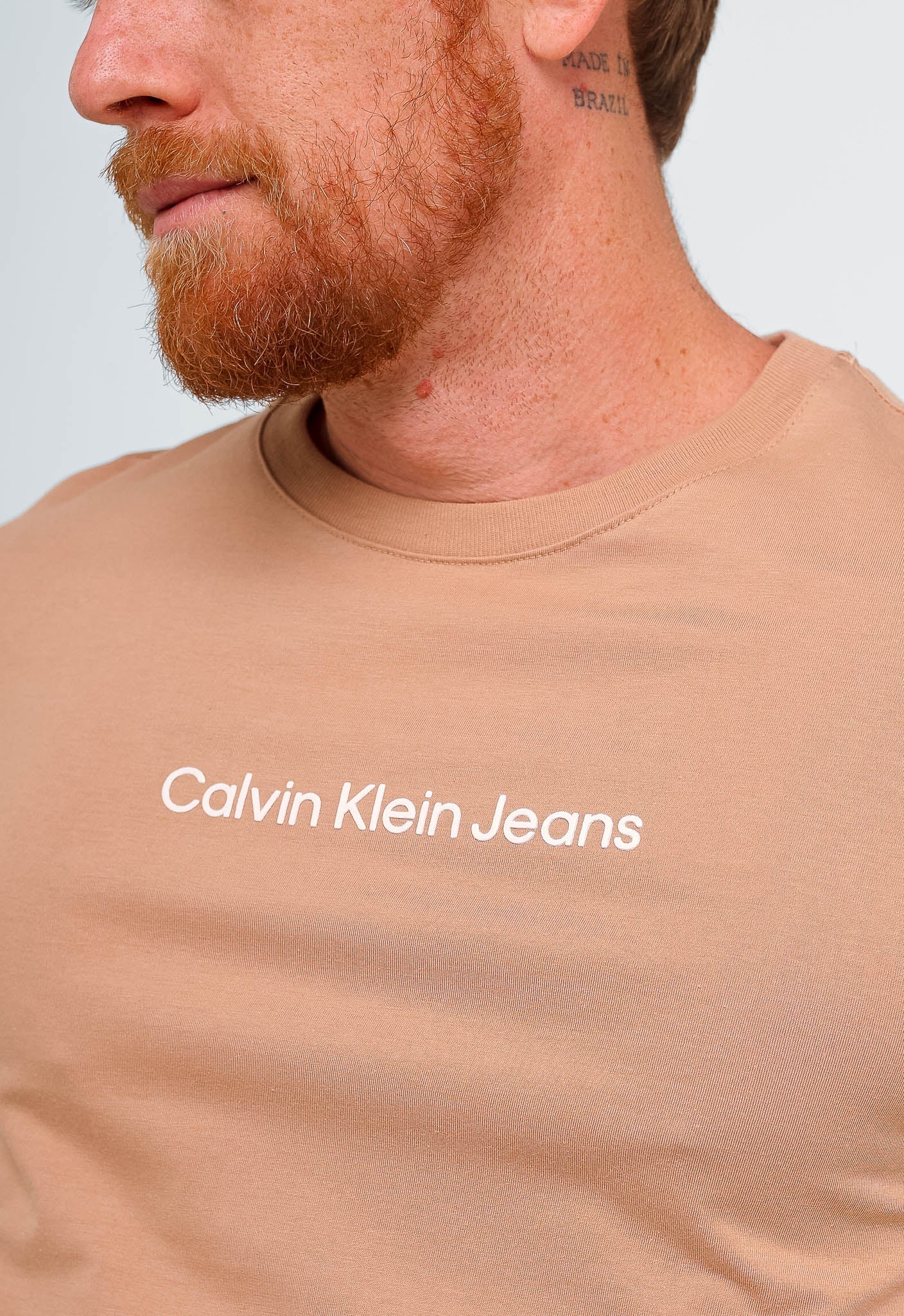 Camiseta Calvin Klein Jeans Logo Central - Sale - Henri Store