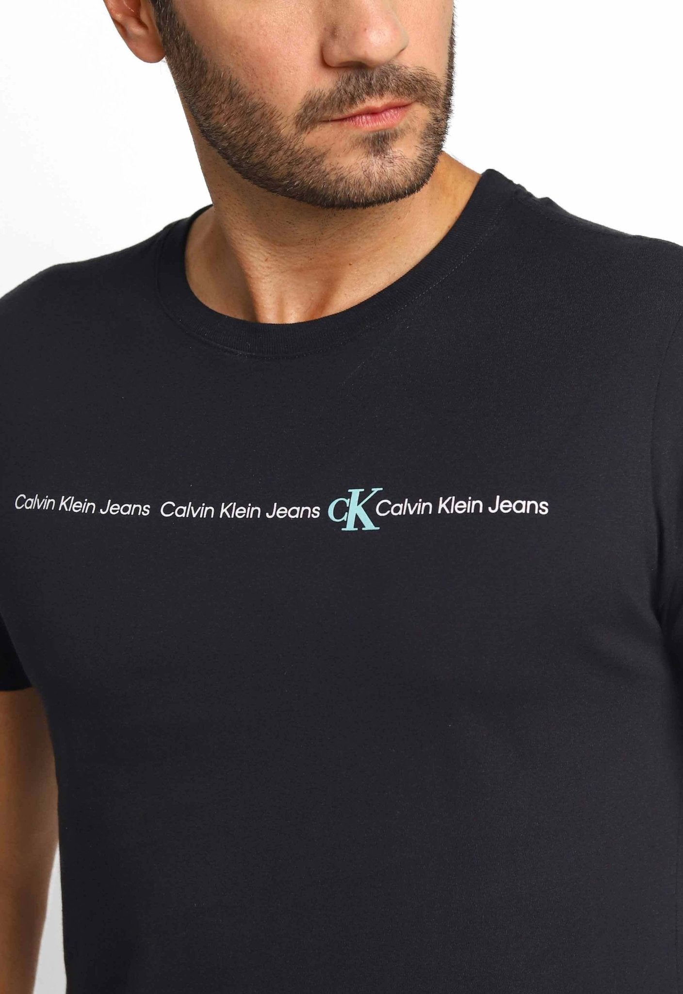 Camiseta Calvin Klein Jeans Logo Central- Sale - Henri Store
