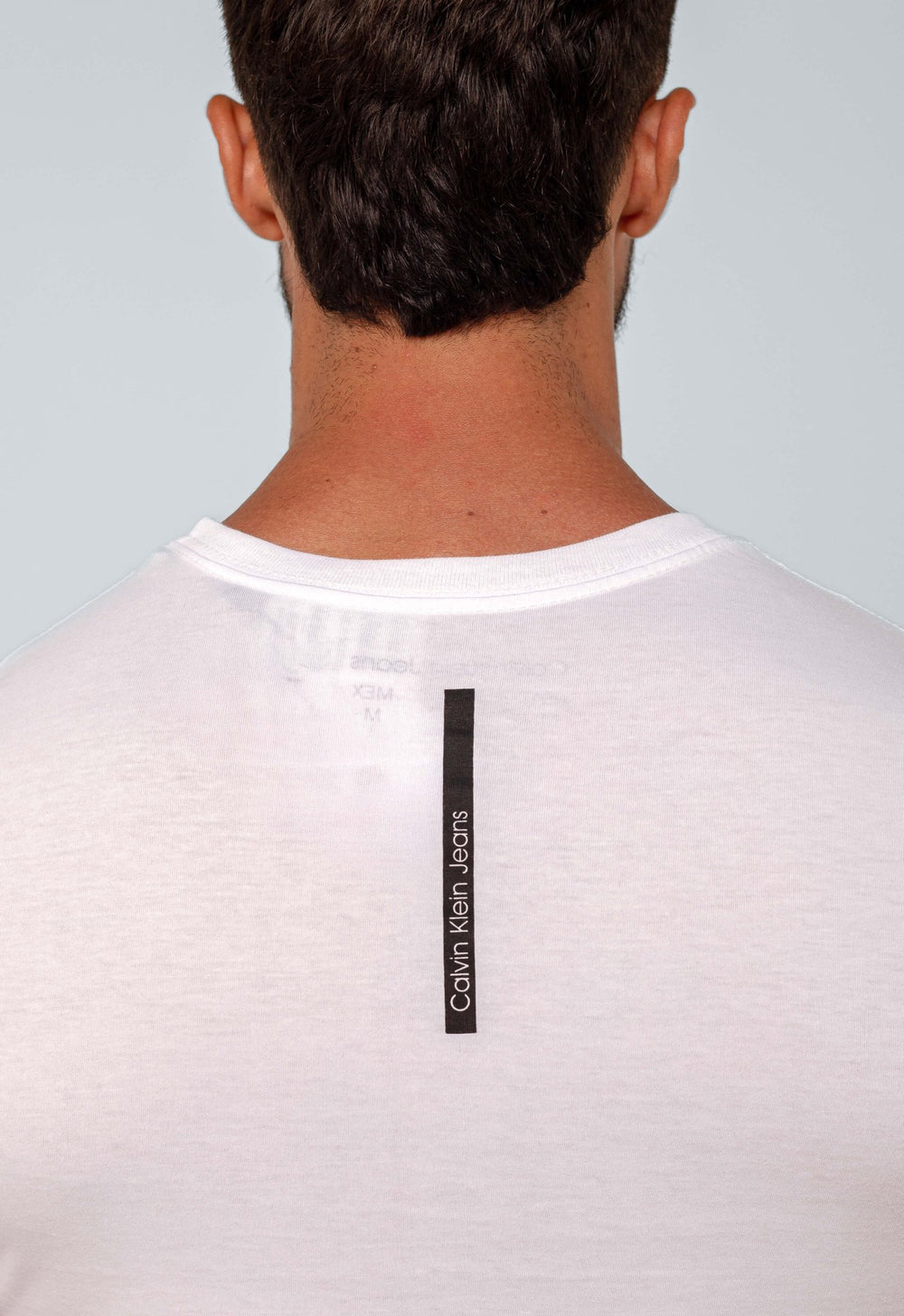 Camiseta Calvin Klein Jeans Logo Central - Sale - Henri Store