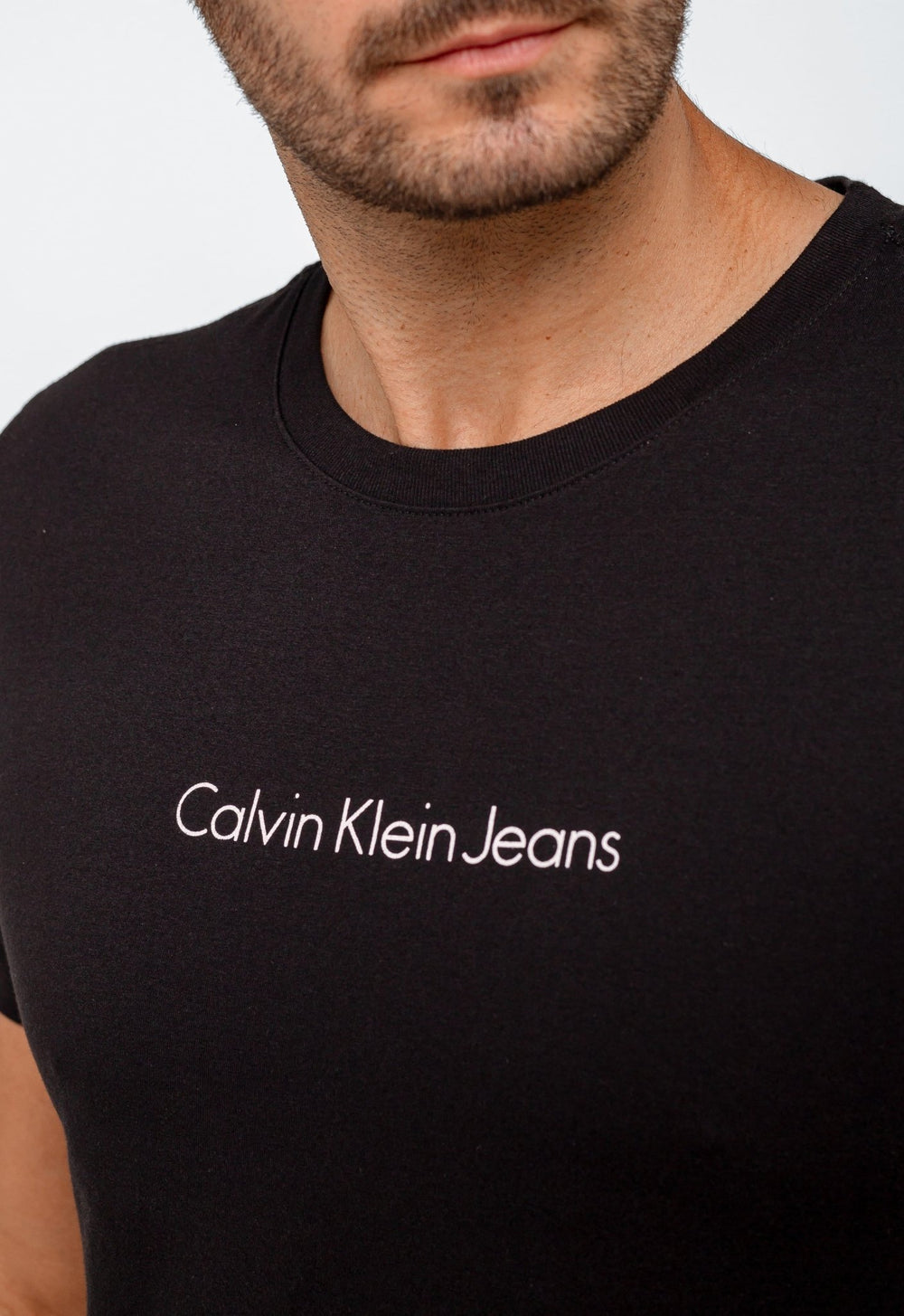 Camiseta Calvin Klein Jeans Logo Central - Sale - Henri Store