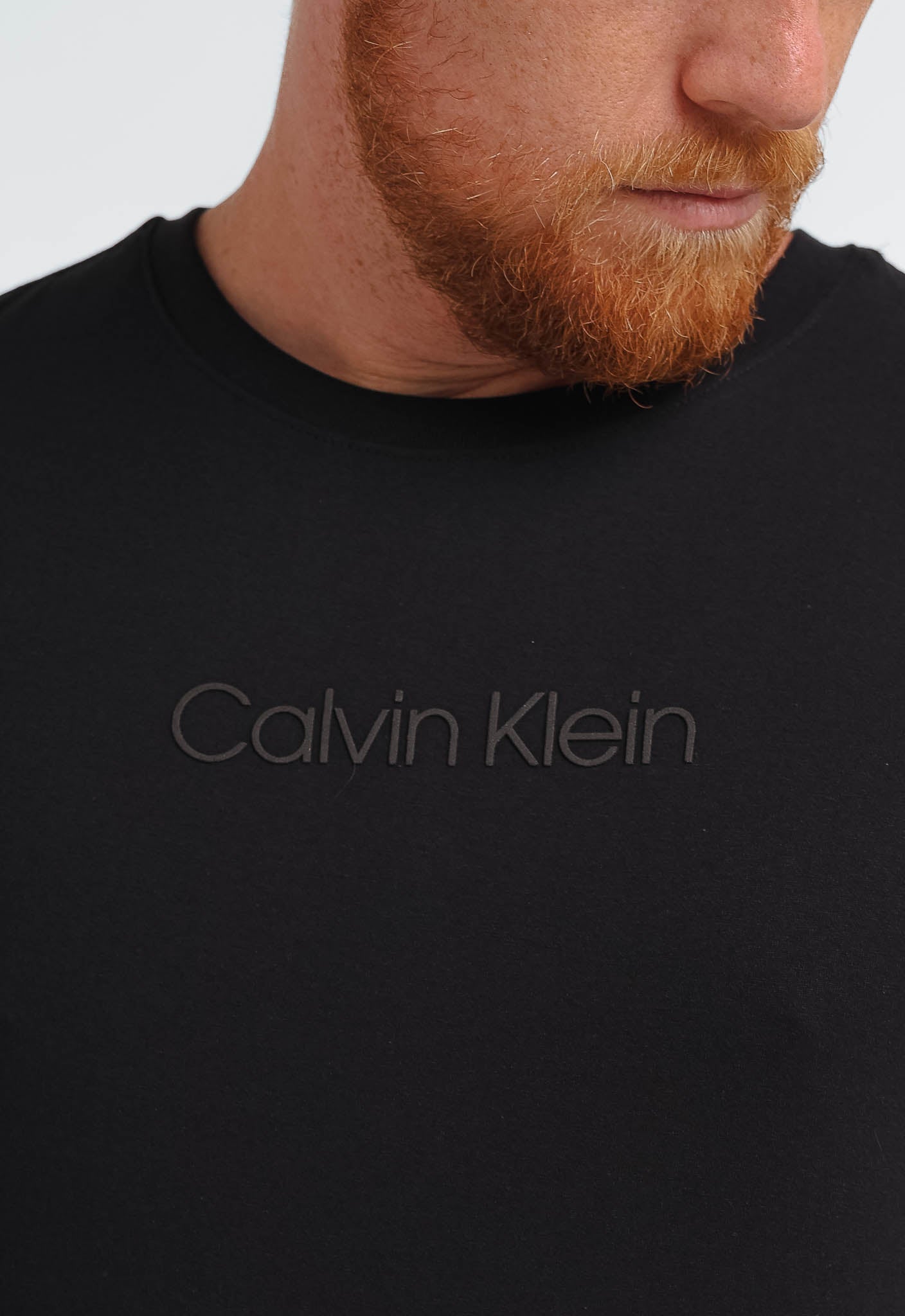 Camiseta Calvin Klein Logo Central Embossed - Henri Store