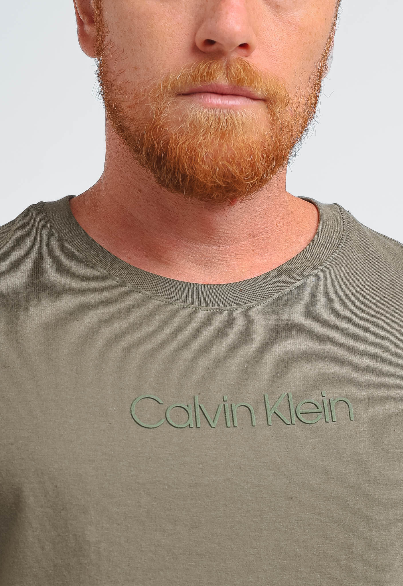 Camiseta Calvin Klein Logo Central Embossed - Henri Store