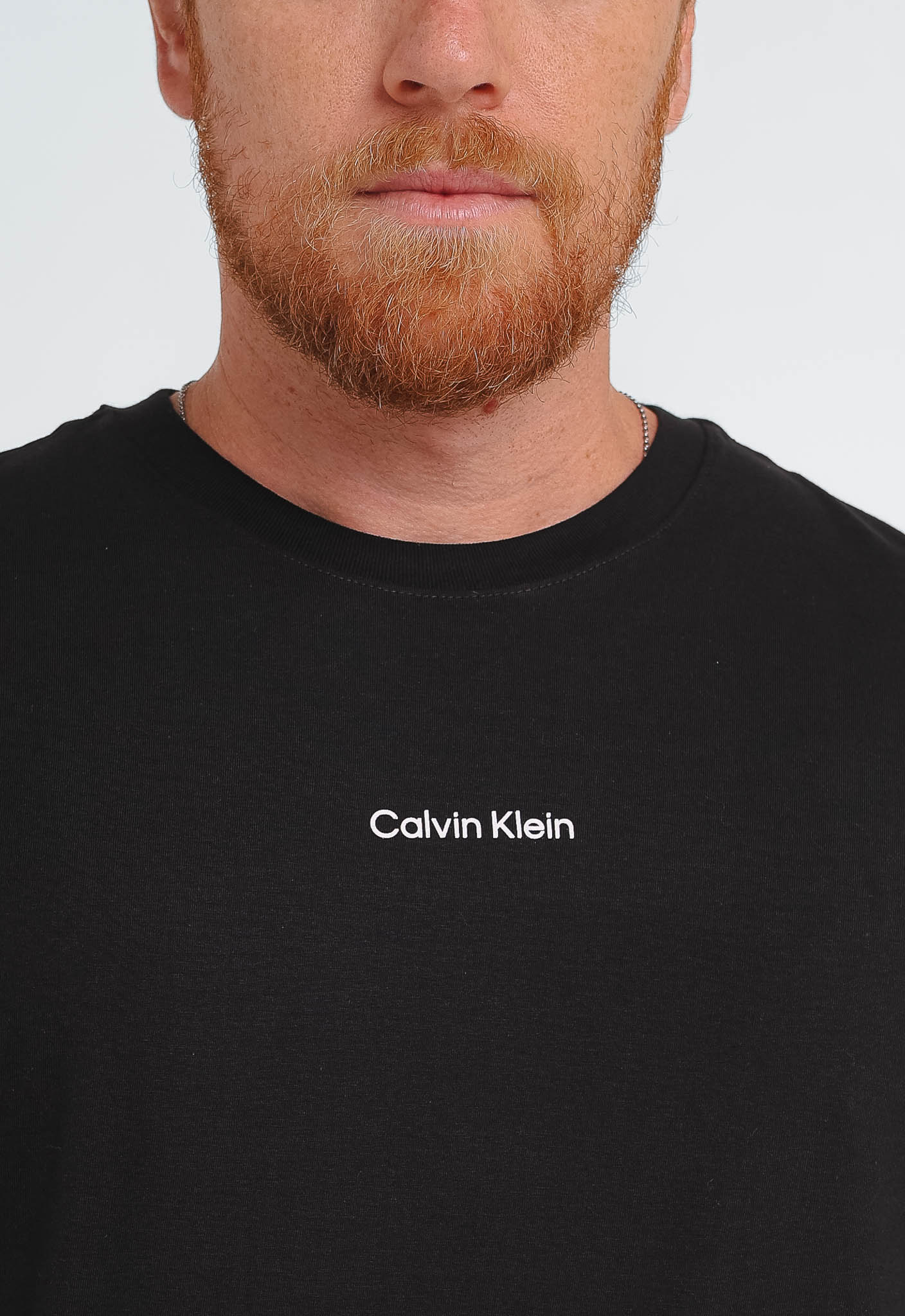 Camiseta Calvin Klein Logo Nano Central - Henri Store