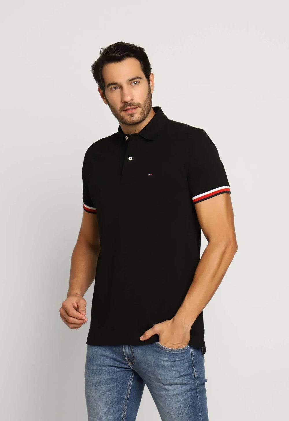 Polo Masculina Regular Fit Tommy Hilfiger com Retilínea no Punho - Henri Store