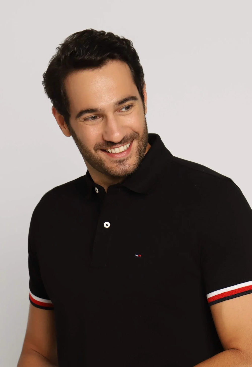 Polo Masculina Regular Fit Tommy Hilfiger com Retilínea no Punho - Henri Store