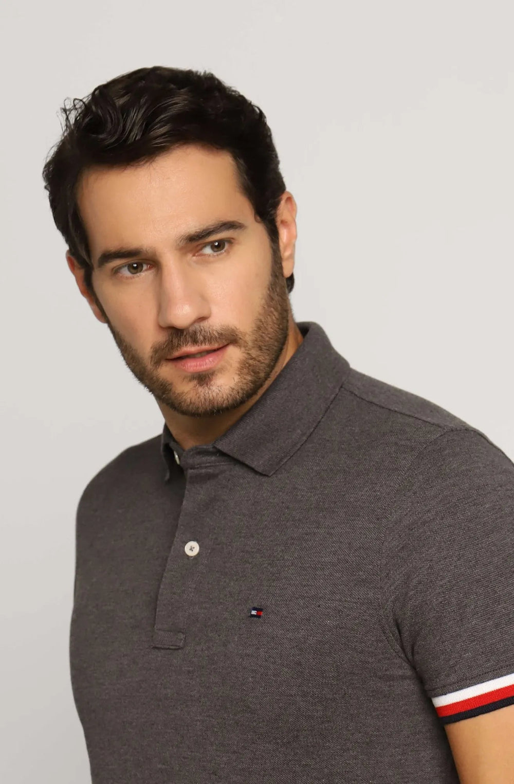 Polo Masculina Regular Fit Tommy Hilfiger com Retilínea no Punho - Henri Store