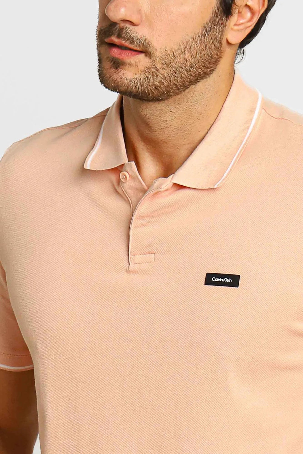 Polo Masculina Slim Fit Calvin Klein com Friso na Gola Rosa Claro - Henri Store