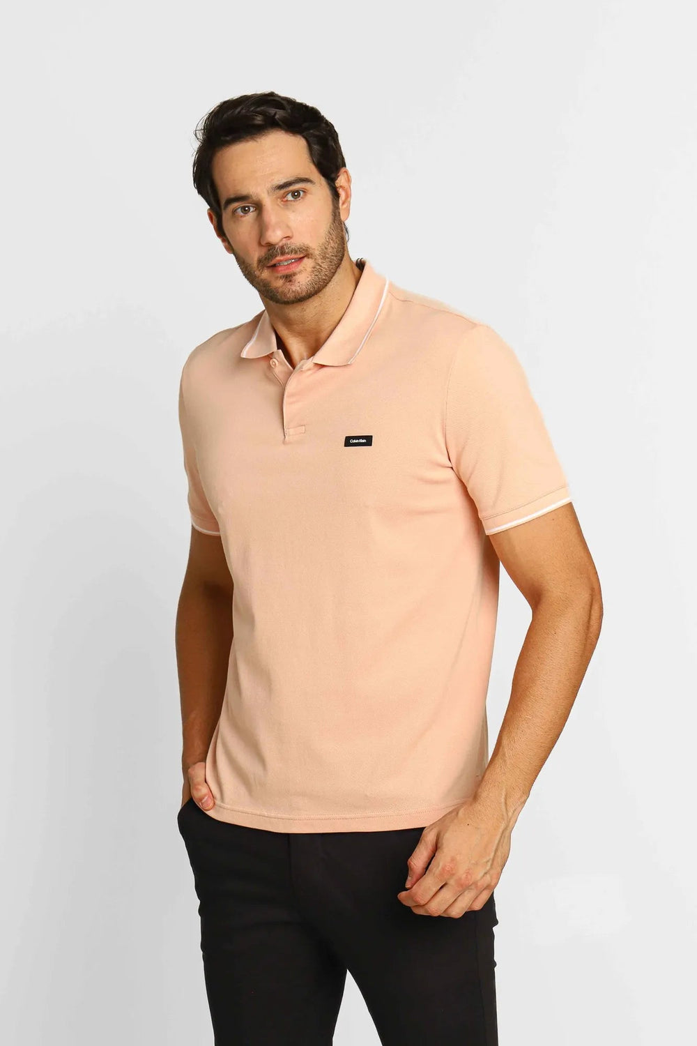 Polo Masculina Slim Fit Calvin Klein com Friso na Gola Rosa Claro - Henri Store