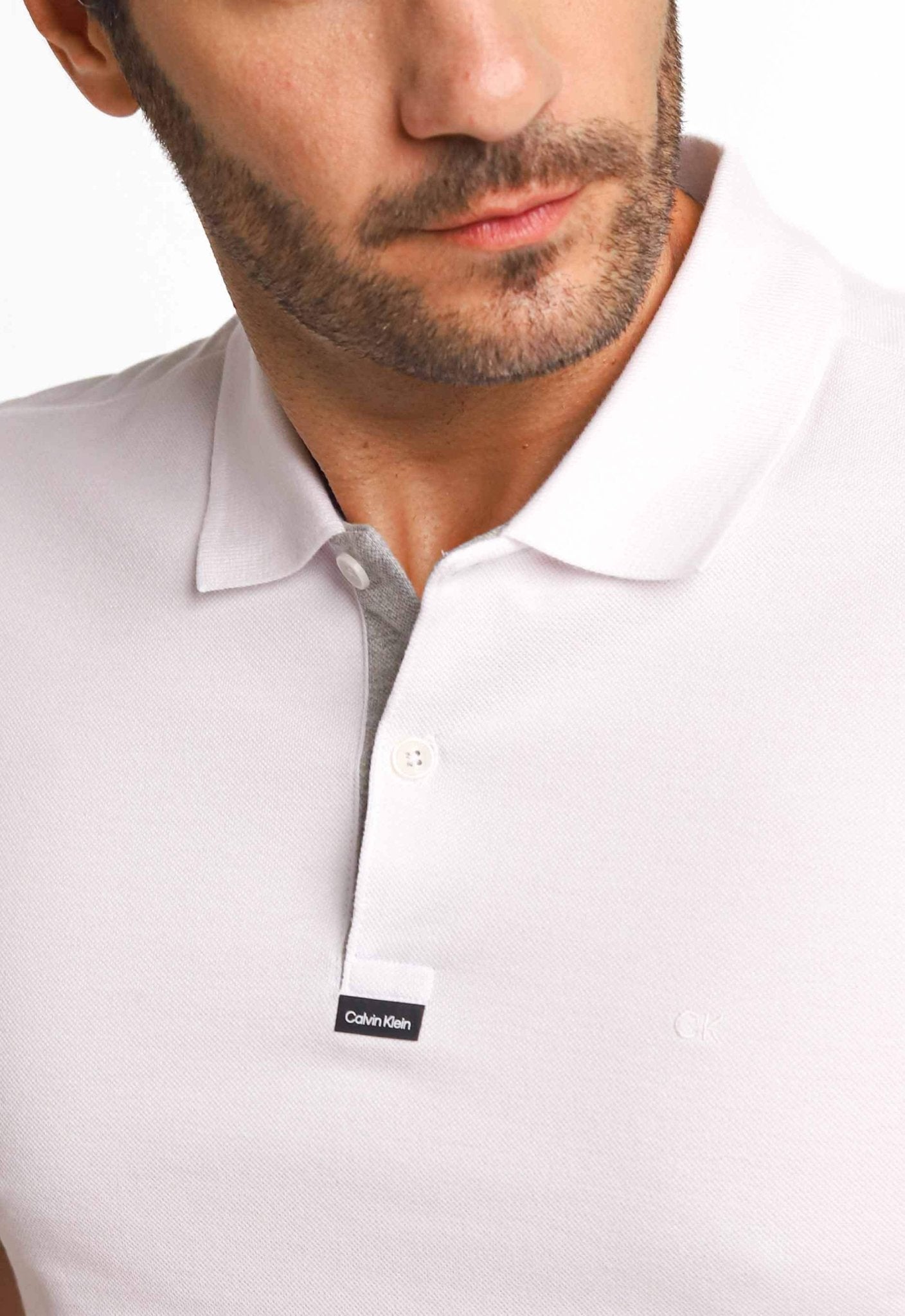 Polo Masculina Slim Fit Calvin Klein com Logo Termocolante Branco - Henri Store